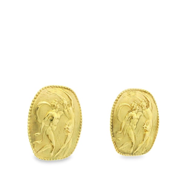 A striking pair of vintage earrings by Athena Seidengang, crafted in solid 18 karat yellow gold and featuring sculptural...