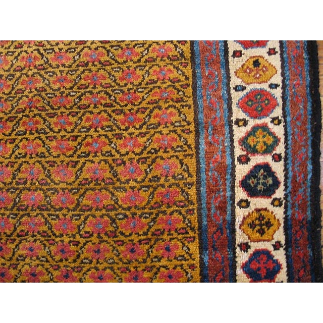 Handmade antique NW Persian carpet. Antique N.W. Persian Hallway Runner Wool Yellow Rug, Circa Date: 1890s. This...