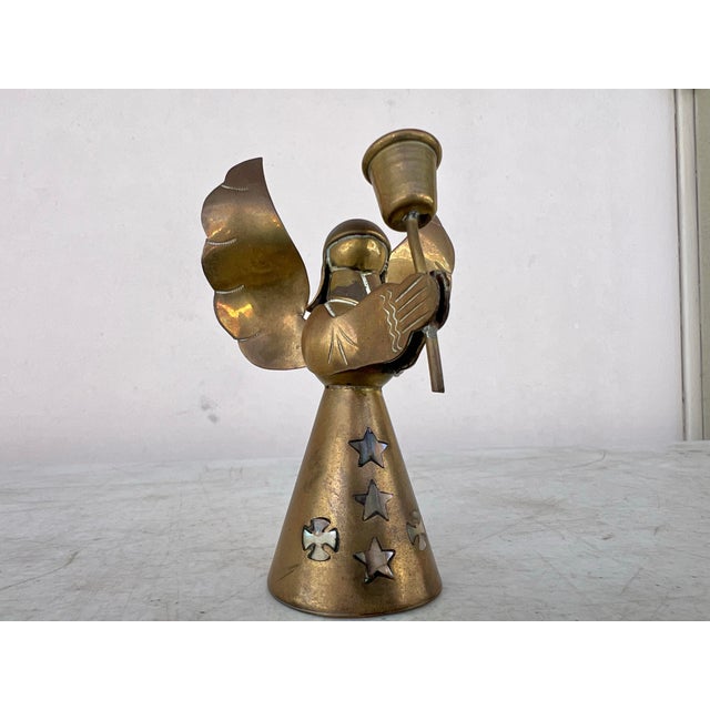 Vintage Solid Brass Christmas Angel Candle Stick Holder. There is Mother of Pearl Inlay in the front skirt . The inlays,...