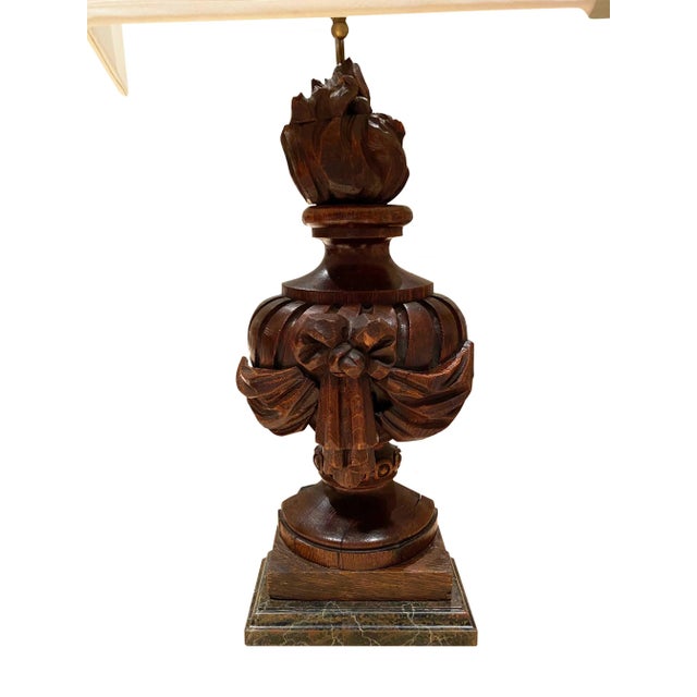 A pair of wood carved 18th century architectural fragments with flames, swags and bow. With custom made silk shades and...