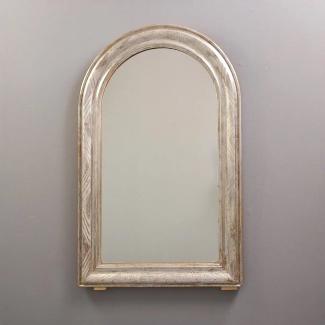Found in France, this original silver gilt mirror frame dates from the 1880s. Classic Louis Philippe style with arched top...