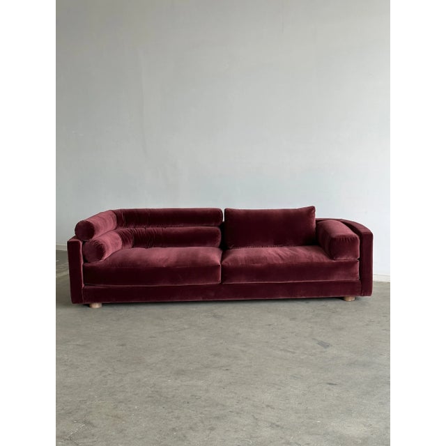 W107 D36 H25.5 SW74 SD21.5 SH17 AH24.5 This fun Post Modern sofa features an asymmetrical silhouette with dramatic...