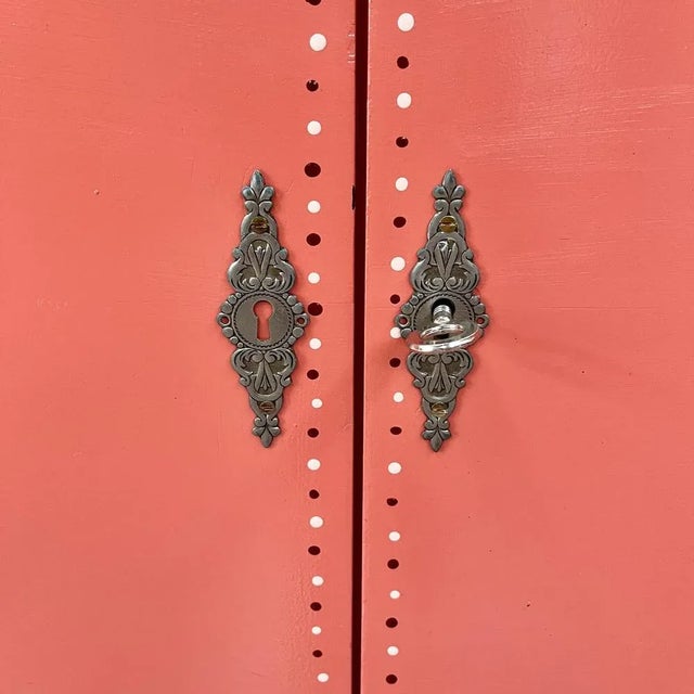 Upcycled Queen Ann sideboard by Kaatje's Classics in salmon pink, with burgundy red and gold paintings influenced by...