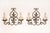 This striking pair of 20th-century French sconces showcases the elegance of wrought iron craftsmanship, beautifully...