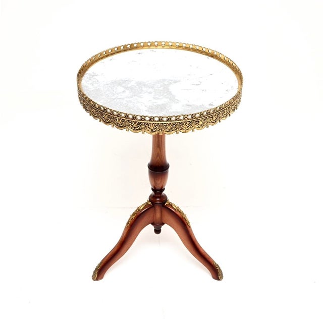 A beautiful and very well made antique French marble top wine table, dating from around the 1930’s. This is of superb...