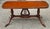 A Federal Style Mahogany and Tooled Leather Top Lyre Base Coffee Table Measures 35.5" in width , 18" on depth, 16.5" in...