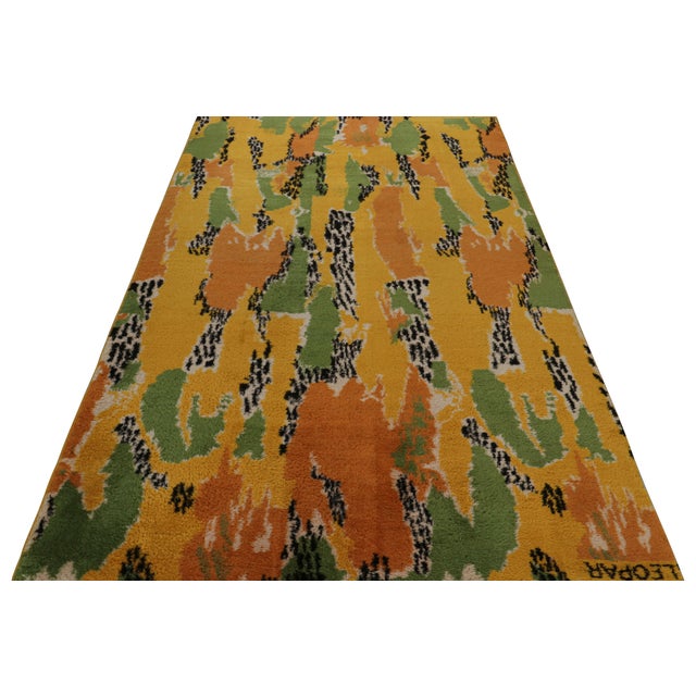 Hand-knotted in wool circa 1960-1970, this 5x9 vintage Art Deco rug is a rare signed piece by Zeki Müren. The artist’s...