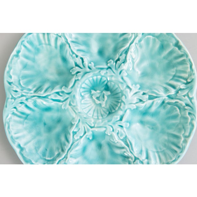 A gorgeous Mid-Century French Gien turquoise aqua blue-green glazed oyster plate, fluted at the edges. Area of the Loire...