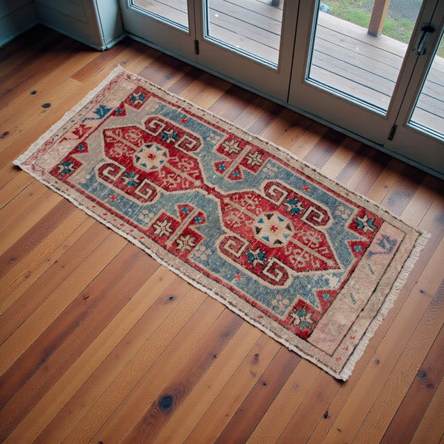 Vintage Turkish Hand-Knotted Door Mat from Chal (Denizli), 1970, featuring warm brick-red and soft sky-blue tones and...