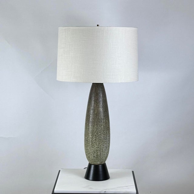 Chic oblong studio ceramic lamp. Gorgeous textured green glaze. Rewired with custom linen shade and diffuser.