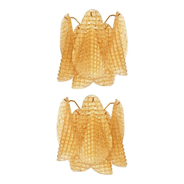 Scenographic and luxury murano glass wall sconces “rondini” elements in murano glass poured over a mold from a traditional...