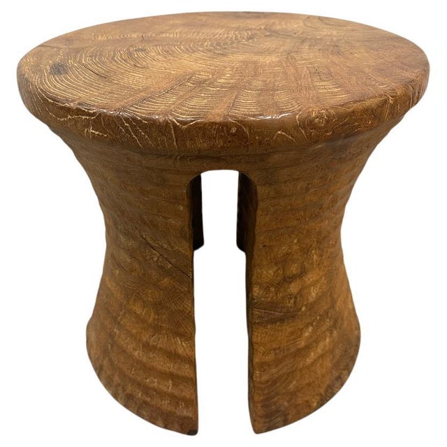 A century old teak wood mortar originally used to grind rice, is repurposed into this minimalist side table or stool. Part...