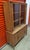 Elevate your dining space with this exceptional showroom-quality mid-century modern china cabinet hutch from Drexel's...