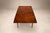 A sculptural Brazilian Modern extendable dining table crafted from richly figured caviúna hardwood in the 1960s. Its...