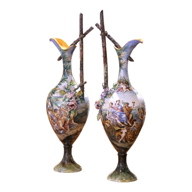 Pair of 19th Century Italian Capodimonte Majolica Ewers With Bacchic Scenes For Sale