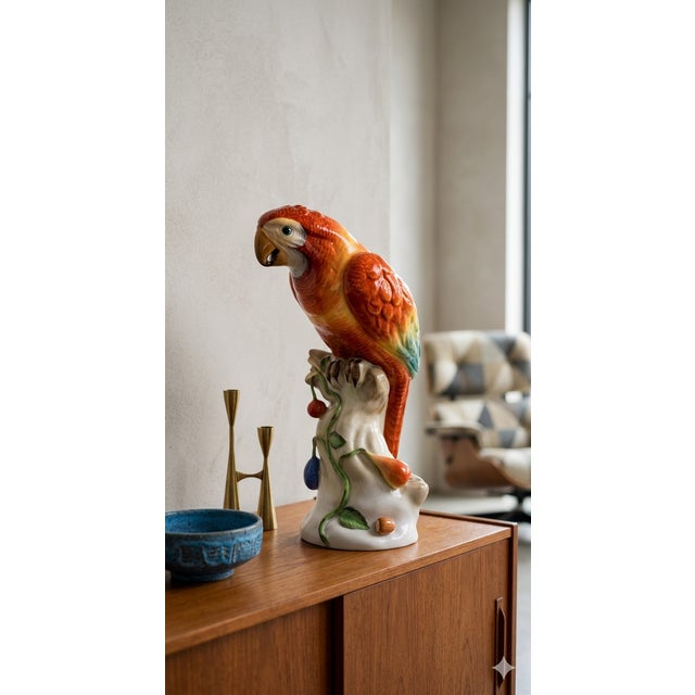 This exquisite porcelain figurine of a parrot, crafted by Herend Hungary, is an outstanding example of masterful...