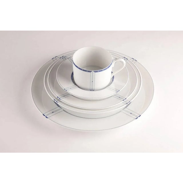 Gwathmey & Siegel inspired by Frank Lloyd Wright designed this pattern. Custom blue five-piece dinner set in original...