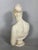 A white marble sculpture depicting a bust of Madame de Récamier after Joseph Chinard (1756-1813). Made of fine, heavy...