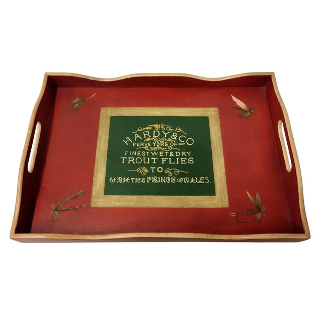 Red tray with green accent and design for Hardy & Co. Purve Yors of Finest wet & dry, Trout Flies to The Prince of Wales....