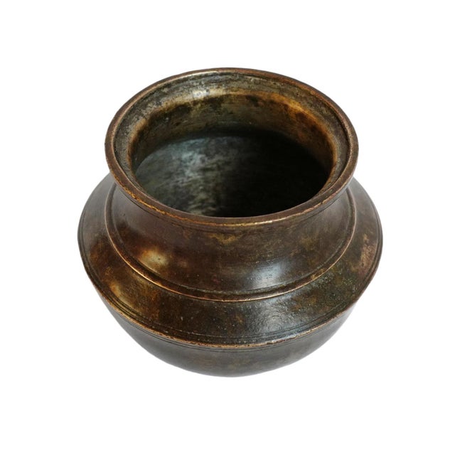 Beautifully timeworn small Nepali bronze vessel inspired by the traditional kalasha form, historically associated with...