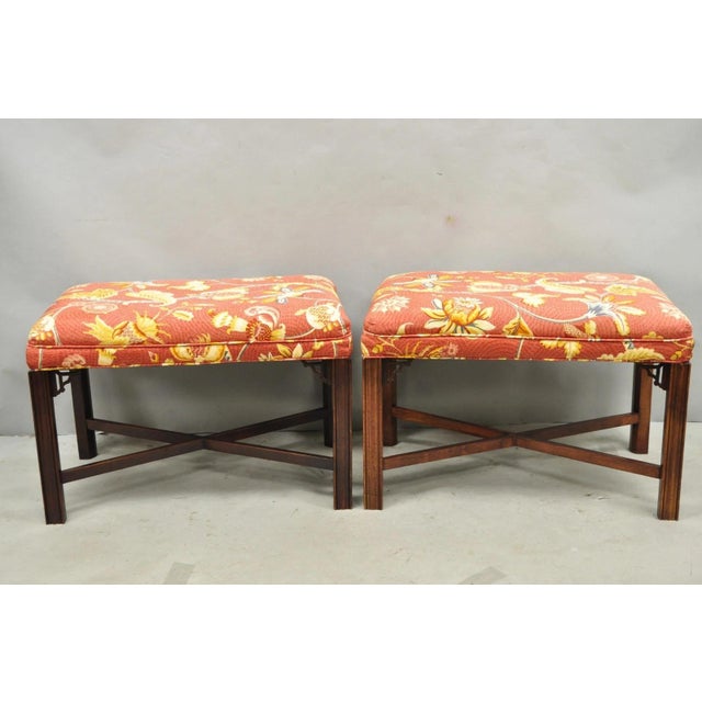 Vintage Chinese Chippendale Style Carved Mahogany Fretwork Bench Stools with Floral Printed Fabric - a Pair. Circa Mid...