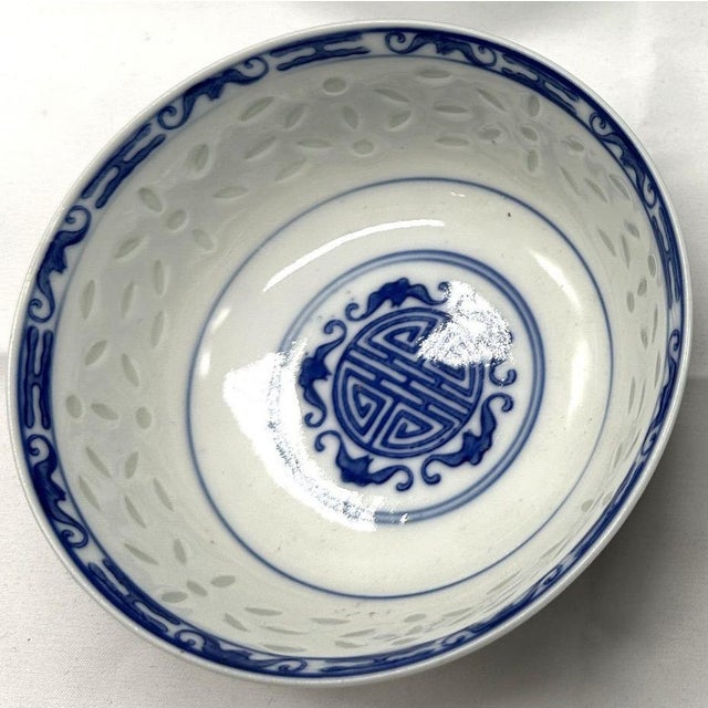 Vintage Set of 4 Jingdezhen Rice Grain Blue & White Porcelain Bowls This exceptional set of four porcelain bowls...