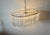 Metal 1970s Large Hollywood Regency Lucite Triedri Two Tier Oval Chandelier With Lucite Rods For Sale - Image 7 of 12
