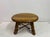 A solid oak coffee table dating from the 1960s, combining rustic weight with a distinctly sculptural presence. The table...