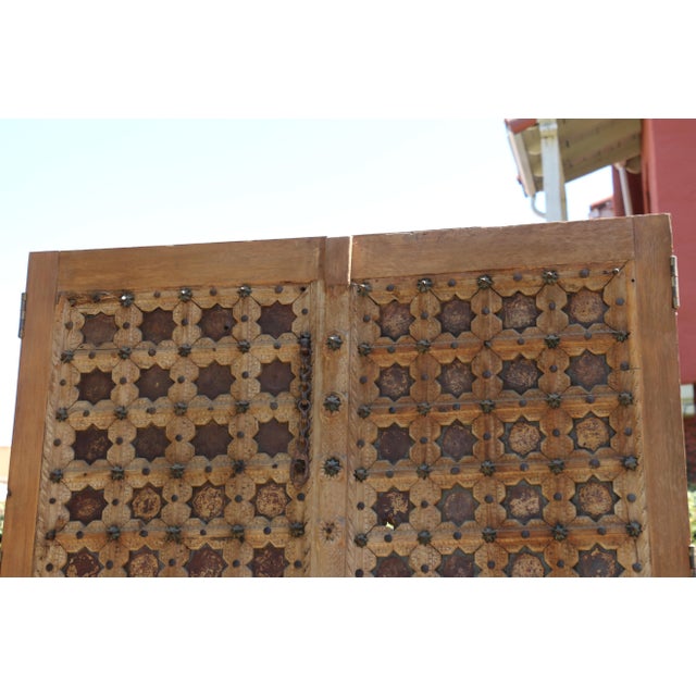 Spectacular 19th-century Moroccan handcrafted temple entry doors featuring an intricate geometric design executed in wood,...