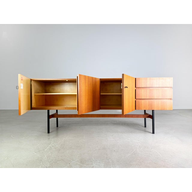 Beautiful midcentury sideboard from the 1960s. The furniture was manufactured by the German manufacturer Musterring and...