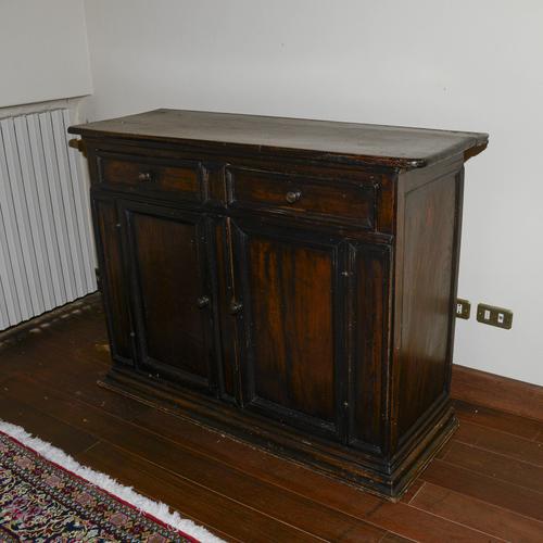 This antique solid wood sideboard is a timeless classic of rustic antiques, capable of conveying warmth and solidity to...
