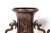 A refined pair of late 19th century Japanese Meiji period bronze vases, each cast with stylized dragon-form handles and a...