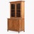 Constructed of solid pitch pine, this pair of late 19th-century French cabinets are each composed of two sections. The...