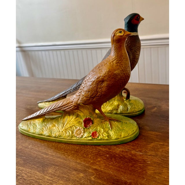 This pair of ceramic pheasants offers a charming decorative element that complements various home aesthetics. This pair...