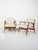Pair of teak armchairs designed by Thomas Harlev for IKEA in 1957: solid frame, sloping backrest, rounded armrests, new...