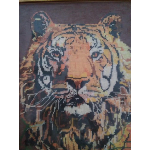 Professionally framed tiger needlepoint from the 1970s makes a big impression. Fabulous tiger portrait! The tiger picture...