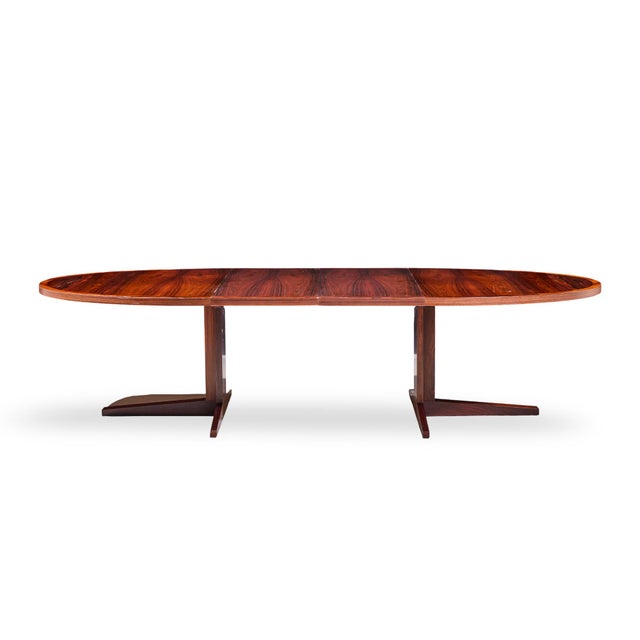 John Mortensen for Heltborg Møbler Mid Century Danish Rosewood Expanding Dining Table with 2 Leaves This table measures:...