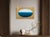The first of Koury's ocean-toned Tapestry works, this oval shifts from a pale, misty grey-blue at the top down into a...