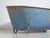 Antique galvanized zinc bathtub with iron structure, originating from Central Europe, circa 1900.This type of metal tub...