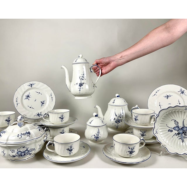 Experience the timeless elegance of European craftsmanship with this grand, comprehensive tea service from Luxembourg....