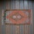 This charming hand-knotted small rug originates from the Chal region of Denizli, featuring a beautifully sun-faded...