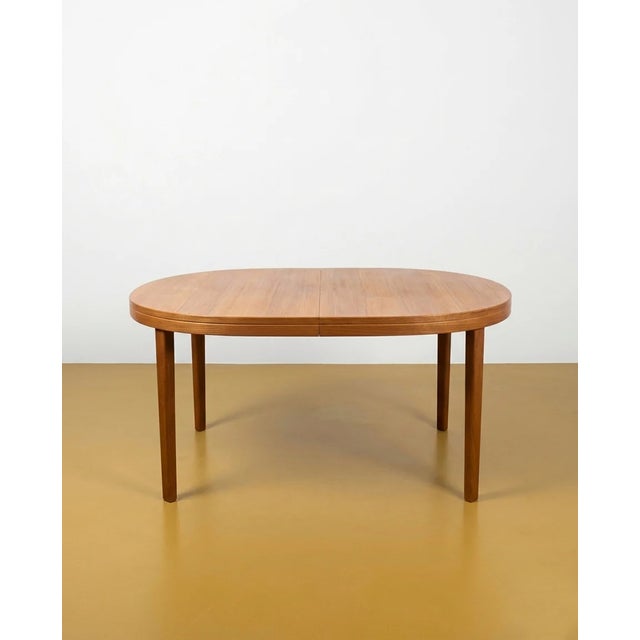 Tibro oval table, vintage Swedish teak from the 1950s, with a central extension, an elegant design perfect for mid-century...
