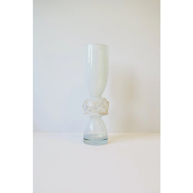 A beautiful, tall and substantial abstract clear and white opaline art glass vase with a slight iridescence, Postmodern...
