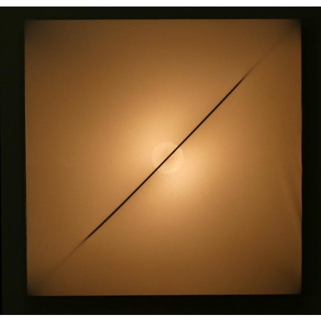 Saori q1 wall and ceiling lamp with a white painted aluminum frame and a white stretch fabric diffuser. Diffused, dimmable...