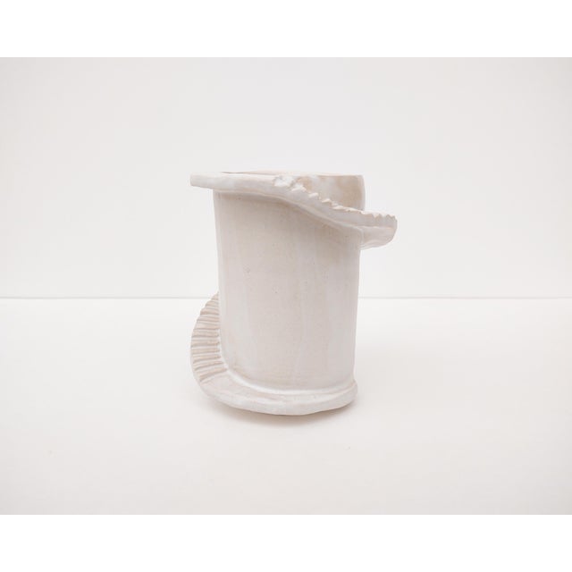 Handmade vase with spiral staircase wrapped around the outside. Made and fired in Los Angeles by Fizzy Ceramics. Glazed...