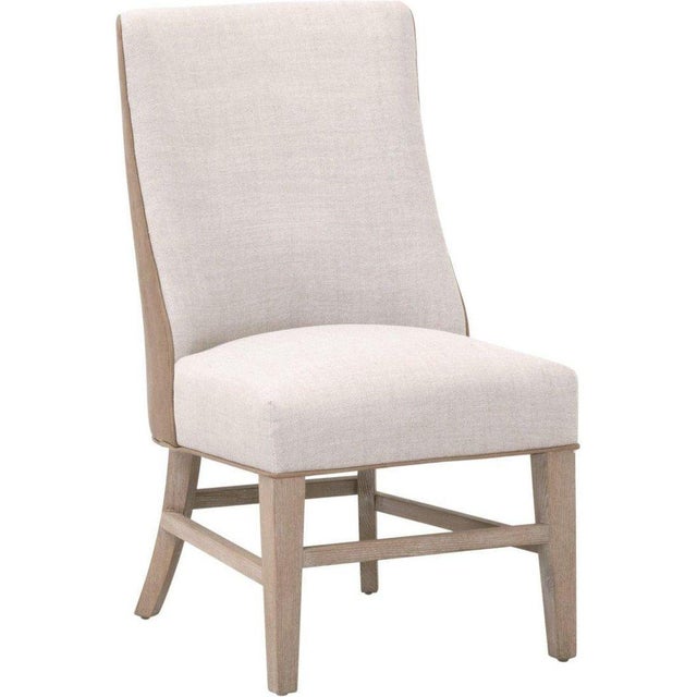 The elegant Duet Head Chair by Essentials For Living features a visually appealing two-tone design that is unique and sure...