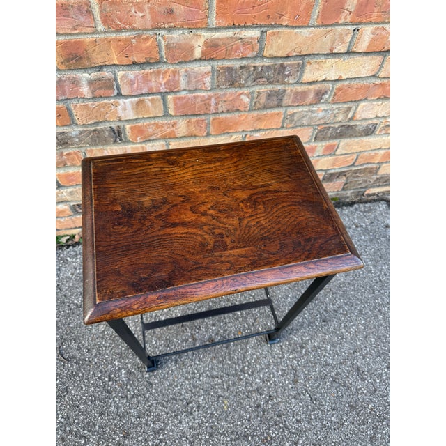 Reclaimed stool tops from a 19th Century English joint stool and remade into a wonderful side table with an iron base,...
