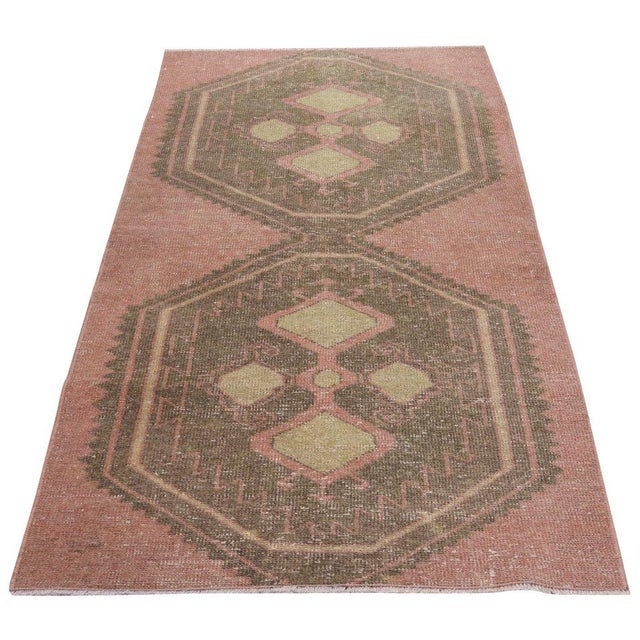 Hand-knotted with care using traditional rug-making techniques, this wool rug blends timeless craftsmanship with a modern...