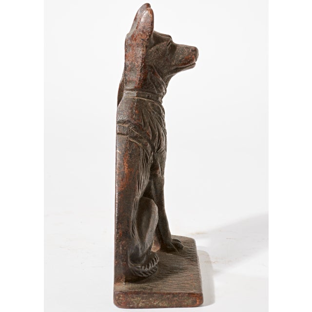 Police dog bookend. Title on bas reads "Chief of Police".
