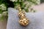 19.2K Gold Our Lady of the Immaculate Conception Pendant, in Worn conditions. Designed 1920 to 1949